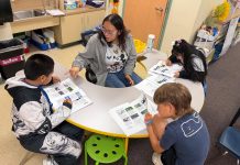 Grant Supports Martin County Summer Reading Camp Students at Port Salerno Elementary's Summer Reading Camp work together in small groups to read and discuss animal coverings and their role in protecting animals from predators and environmental challenges