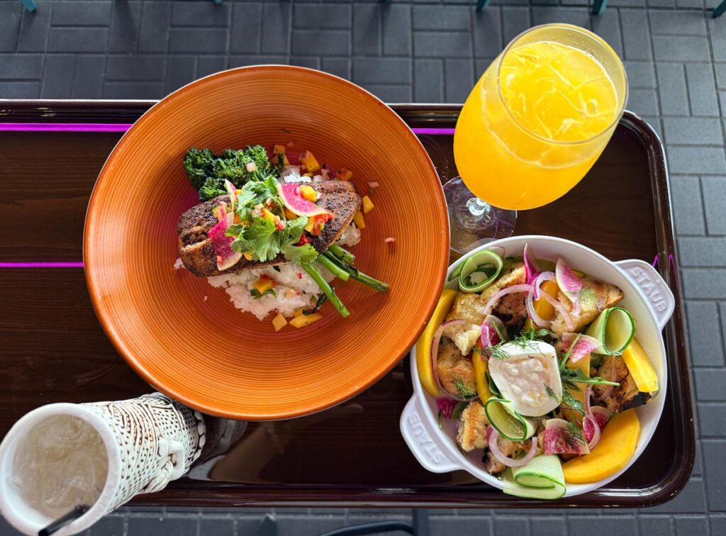 The menu features blackened snapper with coconut rice and mango salsa, as well as mango panzanella salad with grilled focaccia and burrata. Photo courtesy of Circa69