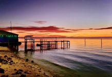 Guide to Enjoying the Bahamas by Boat Waterfront sunsets are part of the fun. Photo by George LaBonte
