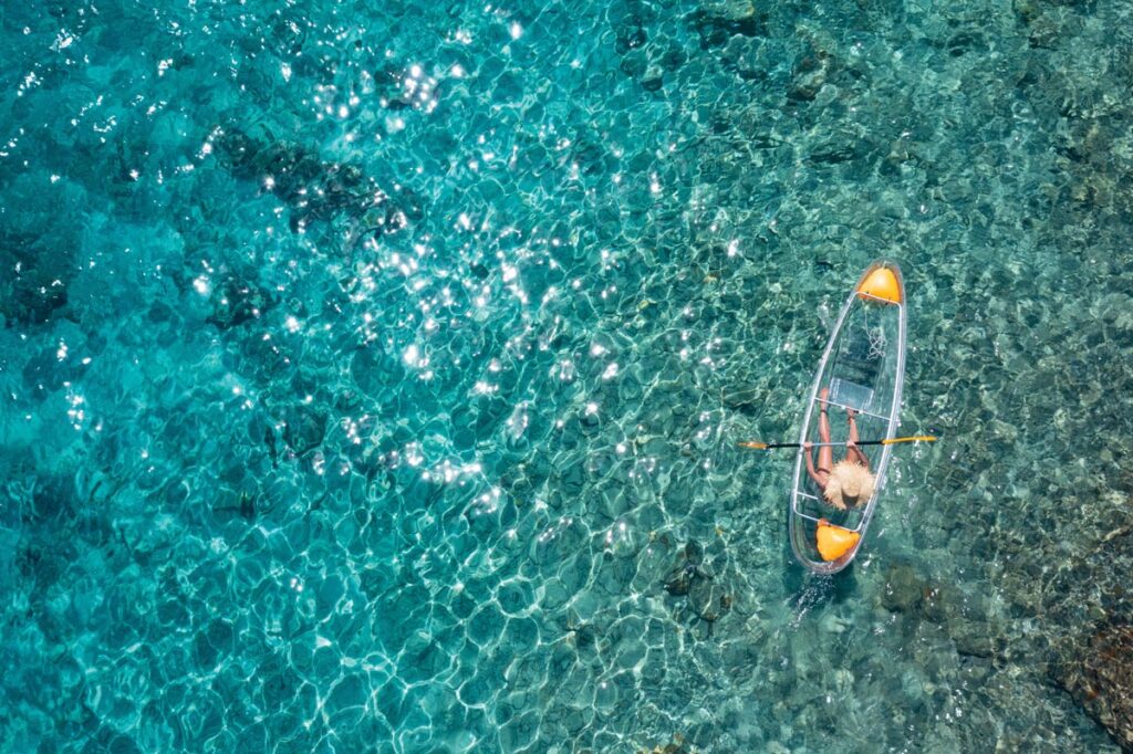 Paddle crystal-clear waters with Get Up and Go Kayaking. Photo courtesy of iStock