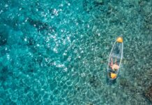 Paddle crystal-clear waters with Get Up and Go Kayaking. Photo courtesy of iStock