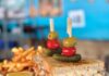 Snag a Seat at Shrimper’s Grill & Raw Bar Shrimper’s fan-favorite crunchy grouper reuben sandwich is sure to stay on the menu under new management. Photo courtesy of EatPalmBeach